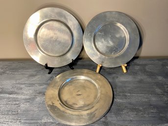 Six Pewter Charger Plates