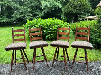 Four Solid Wood Swivel Stools