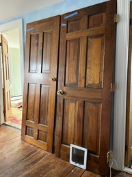 A Pair Of 6 Panel Wood Doors