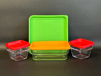 A Set Of Nesting Food Storage Containers In Glass With Plastic Lids