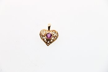 Small 14k Heart Shaped Ruby Pendant