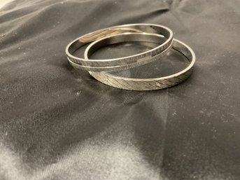 Pair Of Vintage Etched, Textured Silver Tone Bangles