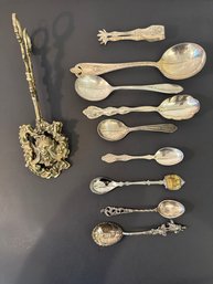 Vintage Brass Tongs With Gargoyle Face Paired With Vintage Silver Plate Spoons, One From Amsterdam