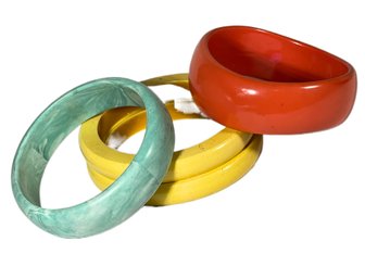 Four Bakelite And Plastic Bangle Bracelets Vintage`