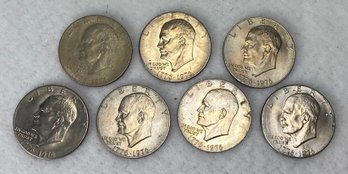 Seven Eisenhower Dollar Coins