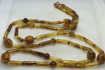 Substantial 46' Vintage Natural BALTIC AMBER Necklace- Carved Eggs With Slender Barrel Panels