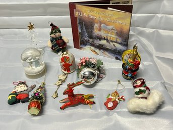 A Collection Of Christmas Decorations  And Thomas KinKade Book