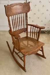 Antique Carved Oak Rocker W/cane Seat