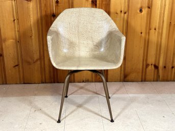 An Authentic Mid-Century Modern Molded Fiberglass Bucket Chair With Swivel Seat