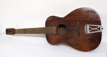 A Six String Acoustic Guitar