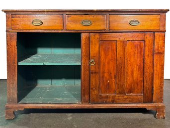 A 19th Century Paneled Pine Buffet With Shelves Beneath