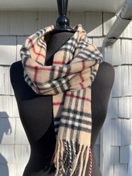 A Cashmere Burberry Scarf In Traditional Plaid
