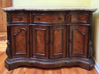 A Marble Top Buffet In Paneled Burl Wood, 'Millennium' By Ashley Furniture