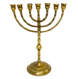 An Antique Brass Candelabrum