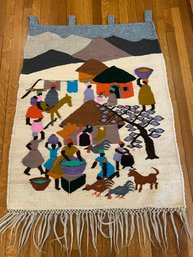 Vibrant Woven Wool Hand Crafted Wall Hanging With Fringe Bottom And Tab Top