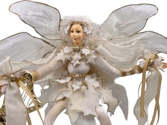 In Shades Of Ivory & Gold With Large Bendable Wings & Posable Limbs This Woodland Faerie Is Sure To Delight!