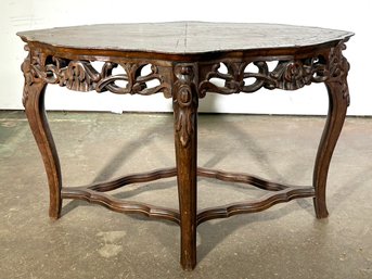 A 19th Century Tiger Mahogany Coffee Table With Carved Details