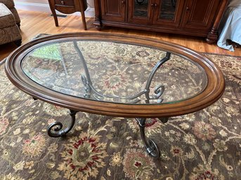 Oval Wood And Beveled Glass Top Iron Base Coffee Table