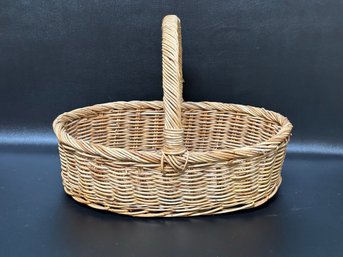 A Very Nice Oval Basket With A Top Handle