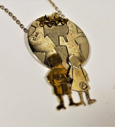 Sterling Silver Mixed Metals Chain Necklace Having Pendant Of Children And Globe`