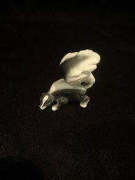 Mini Skunk Figurine