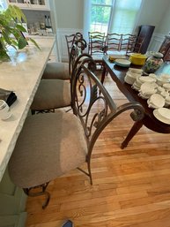 THREE MATCHING CAST IRON BAR STOOLS