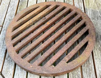 A Vintage Cast Iron Grate