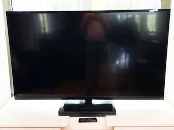 A Vizio 60' Flat Screen TV