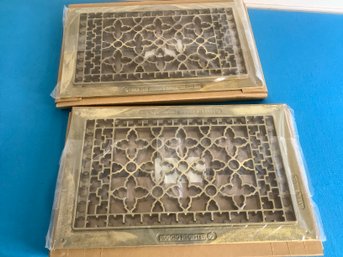 PAIR OF BRASS GRILLES