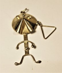 Odd Figural Sterling Silver Pendant Of Figure With A Triangle