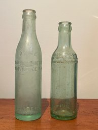 Two Vintage Drink Bottles- Moxie And Orme Carbonating Co.