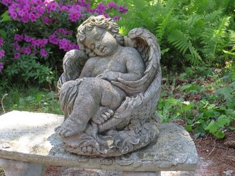 A Sleeping Cherub In Woven Basket Concrete Garden Statue