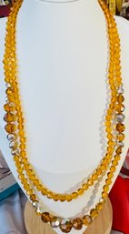 DOUBLE GRADUATED AMBER GLASS FACETED NECKLACE