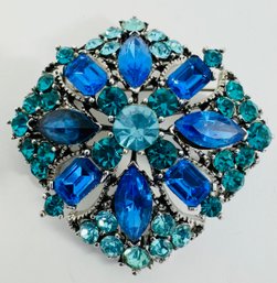 BLUE AND TEAL SILVER TONE RHINESTONE BROOCH