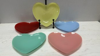 A Group Of Heart Glass Dishes