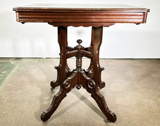 A 19th Century Eastlake Victorian Side Table In Carved Mahogany