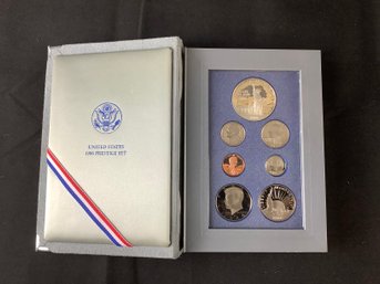 United States 1986 Prestige Set With 90  Silver Dollar In Original Box And COA