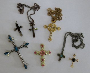 A Grouping Of Crucifix Necklaces And Some Loose Cross Pendants