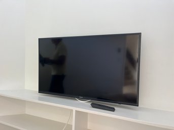 A Samsung 40 Inch TV - Model UN40MU6300F - Wall Mount Bracket