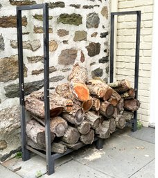 A Modern Metal Wood Holder And Fire Wood