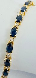 STUNNING 14K GOLD BLUE SAPPHIRE AND DIAMOND TENNIS BRACELET