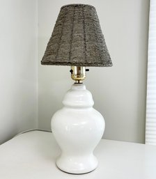 A Ceramic Lamp With Beaded Shade By Laura Ashley