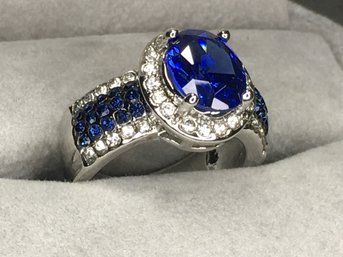 Wonderful 925 / Sterling Silver Ring With Sapphire - Center And Channel Set - With Sparkling White Topaz