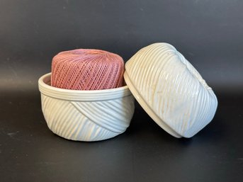 A Whimsical Yarn Holder In Ceramic