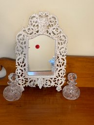 ANTIQUE CAST IRON EASELBACK MIRROR W/ TWO CUT CRYSTAL COLOGNES