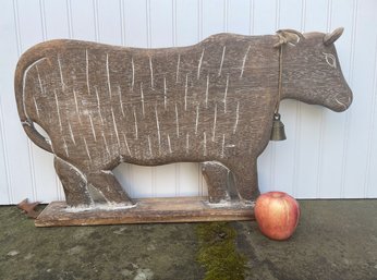 A Carved & Distressed Wood Farmhouse Cow, With Brass Bell