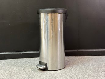 A Tall Kitchen Trash Can In Brushed Stainless Steel By Simplehuman