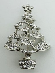 PRETTY SILVER TONE AND WHITE RHINESTONE CHRISTMAS TREE PIN