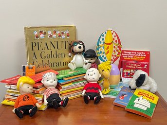 A Group Of Vintage Mid Century Branded Peanuts Characters And More Children's Items