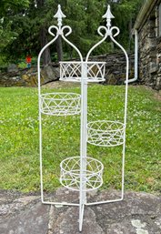 A Vintage Wrought Iron Folding Plant Stand